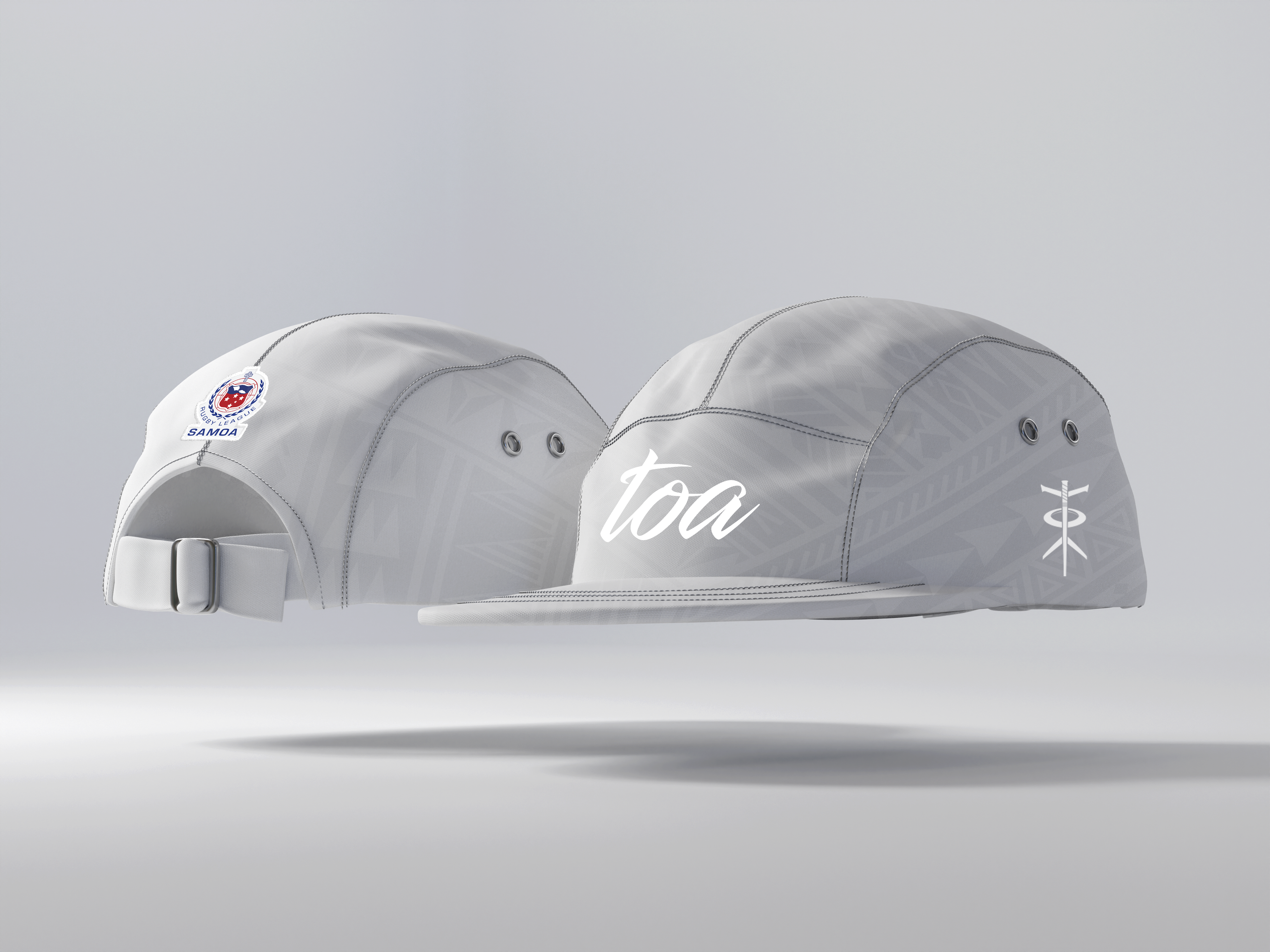 Two gray caps with branding on a light gray background